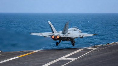 US fighter jet taking off from an aircraft carrier over the sea amid rising tensions in the Middle East.