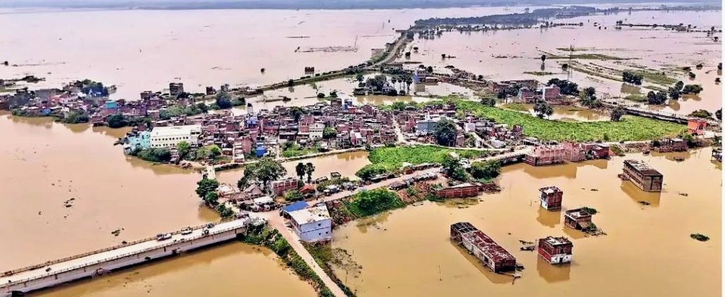 Floodwaters in Sheikhpura force school children to travel by boat to reach school