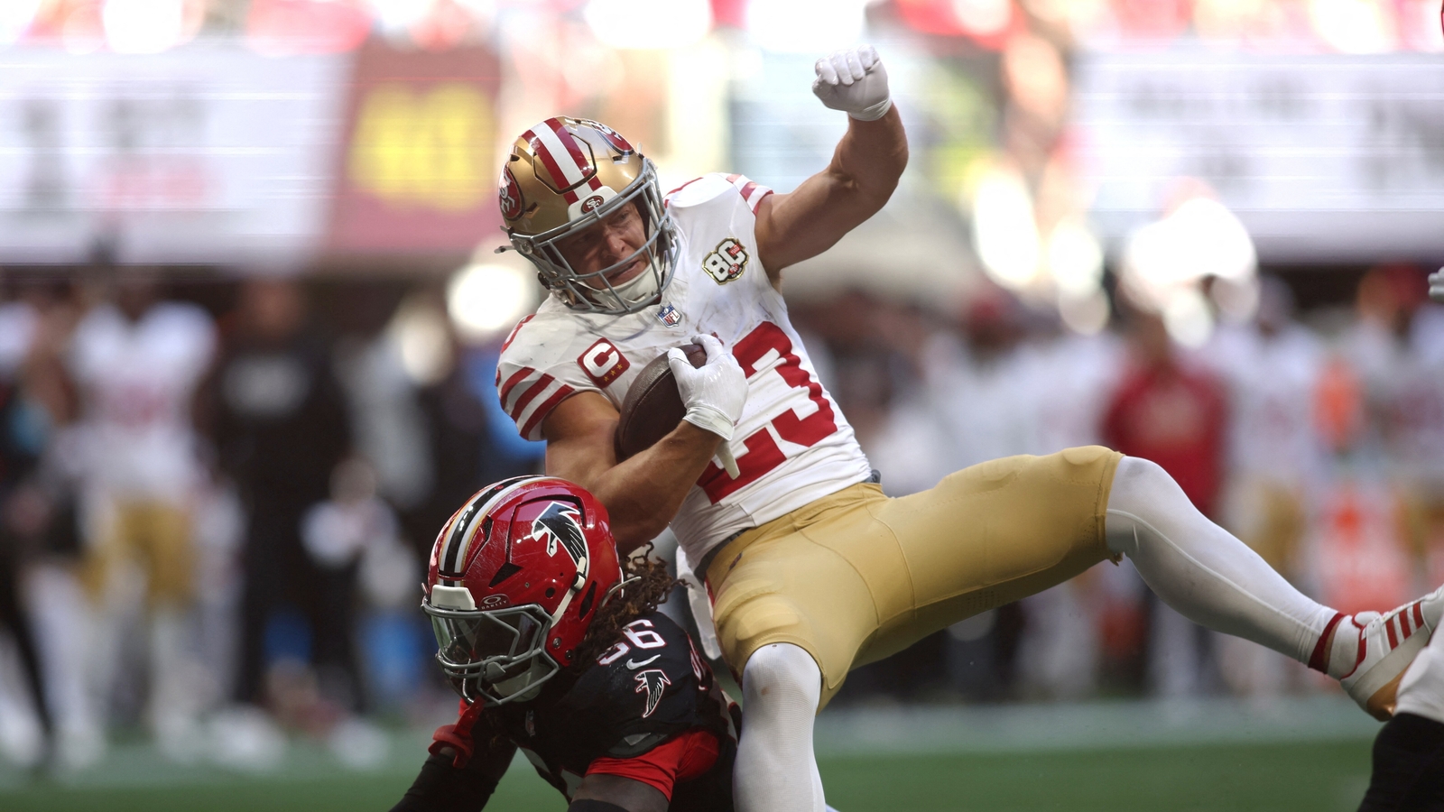 Christian McCaffrey is questionable to return vs Falcons. (IMAGN IMAGES via Reuters Connect)