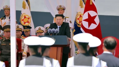 North Korea's Kim claims progress on nuclear-armed navy with new warship